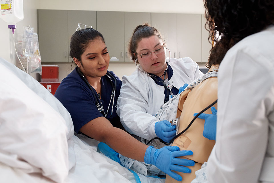 Smith Chason Students Hands On learning in the mock medical rooms